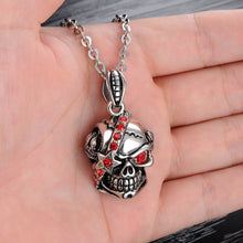 Load image into Gallery viewer, Bloody Stainless Steel and Cubic Zirconia Skull Pendant
